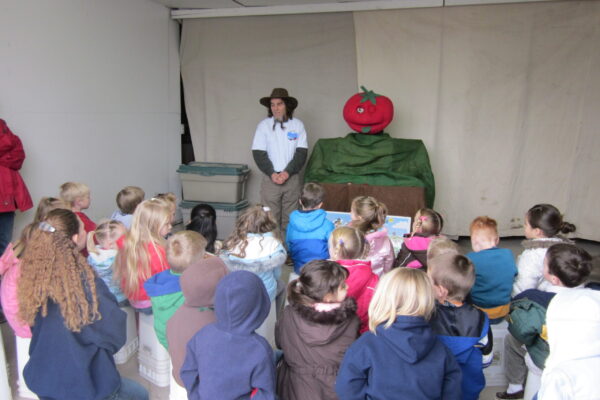 Listening to Terry Tomatoe tell us about plants.